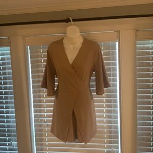 Beautiful boutique jumper. Size small, tan color.